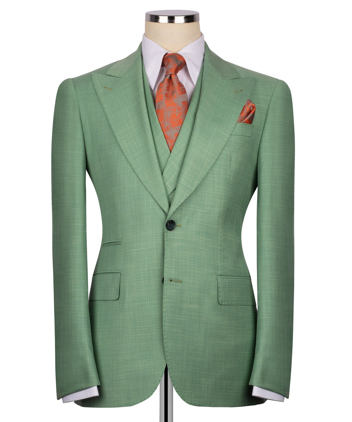Back view of green suit jacket with single vent; orange patterned tie