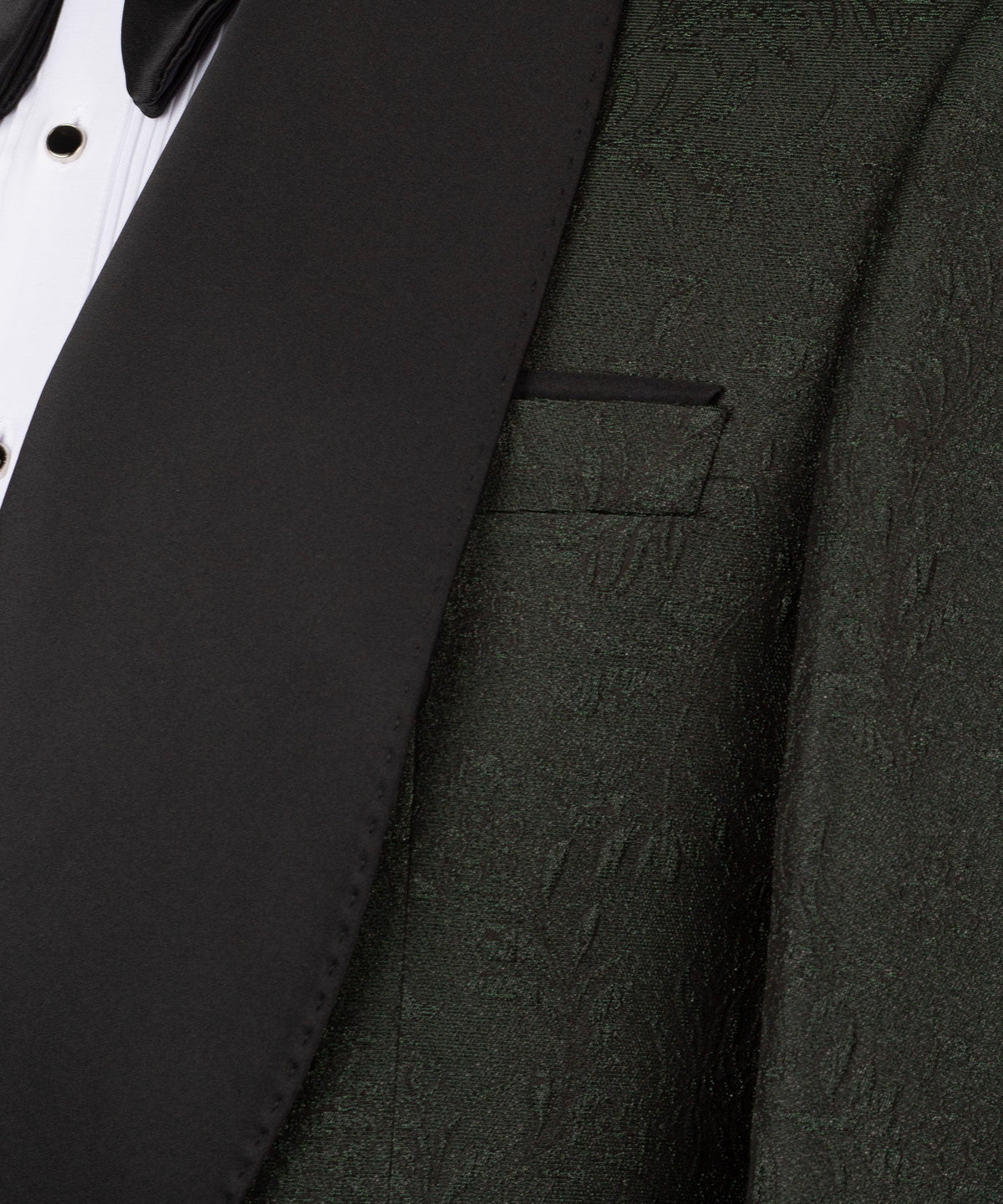 Close-up of black lapel and breast pocket on dark green shiny tuxedo jacket