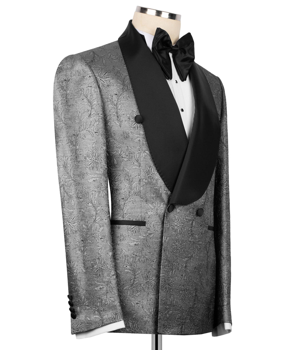 Shiny tuxedo jacket with black satin peak lapel and bow tie; metallic silver floral
