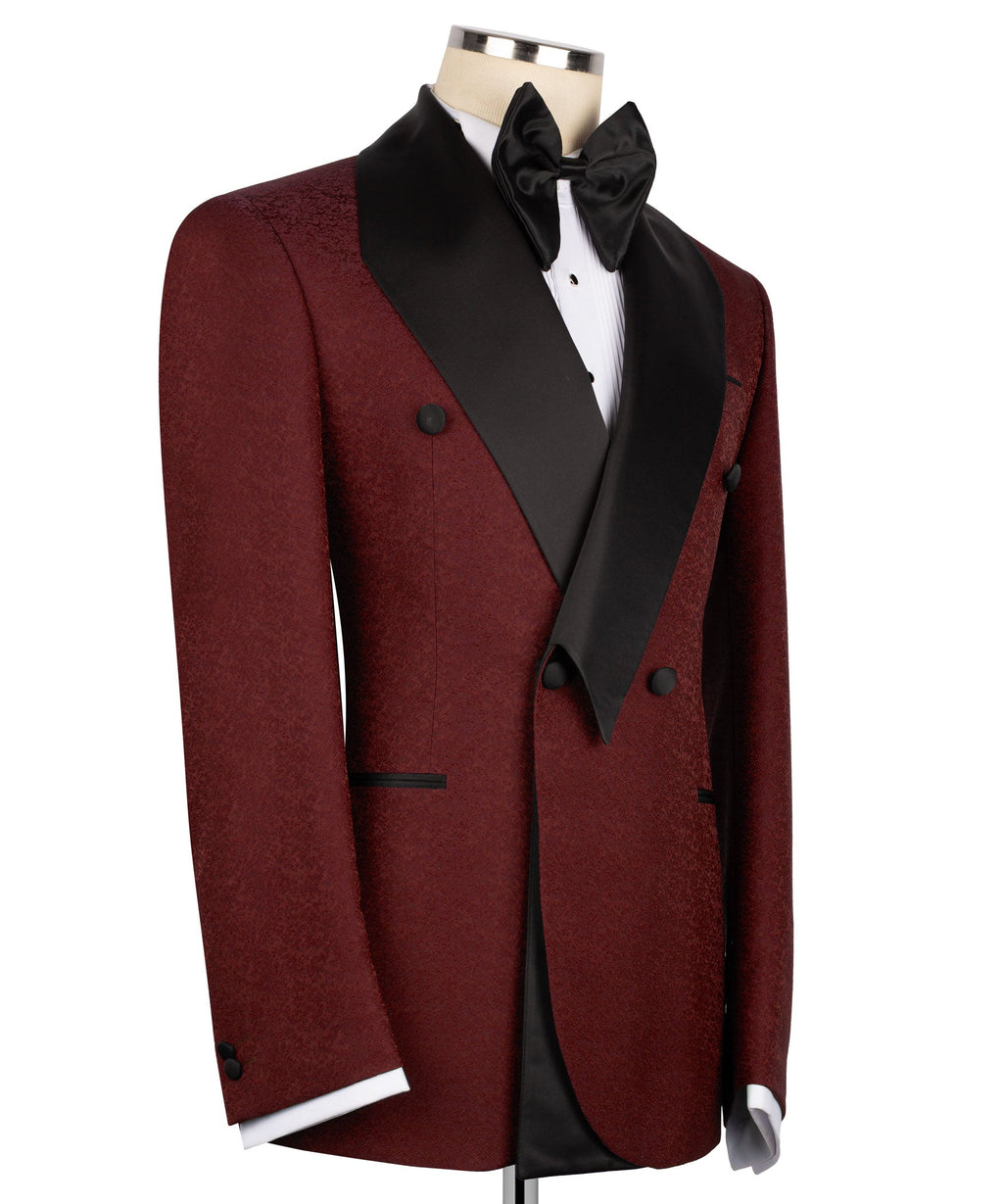 Burgundy tuxedo suit with black vest, satin trim, and self-tie bow