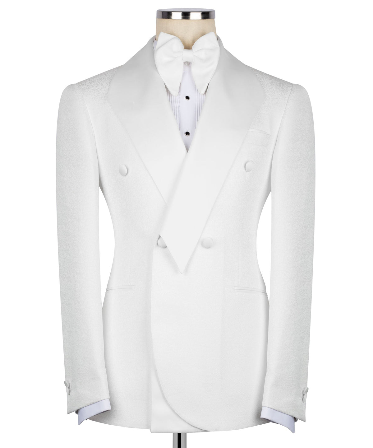 White tuxedo jacket with geometric bow tie, pointed lapels, and matching vest