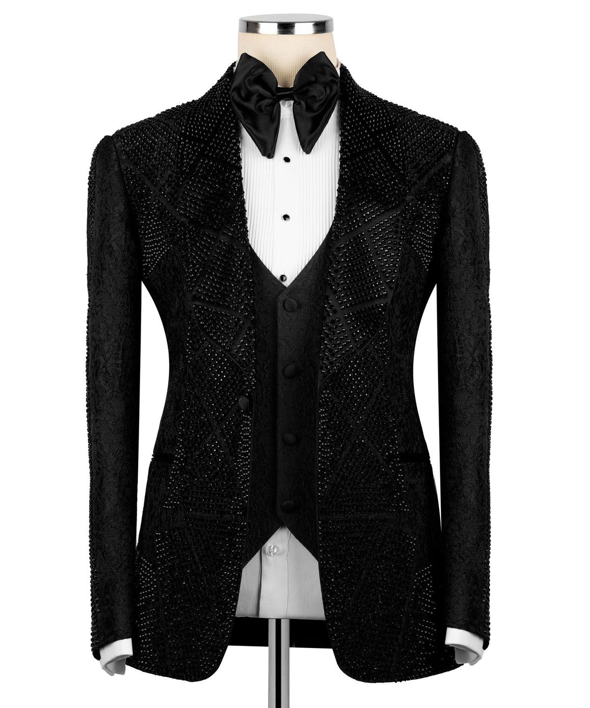 Black stone-embroidered tuxedo jacket with satin bow tie and waistcoat over white shirt
