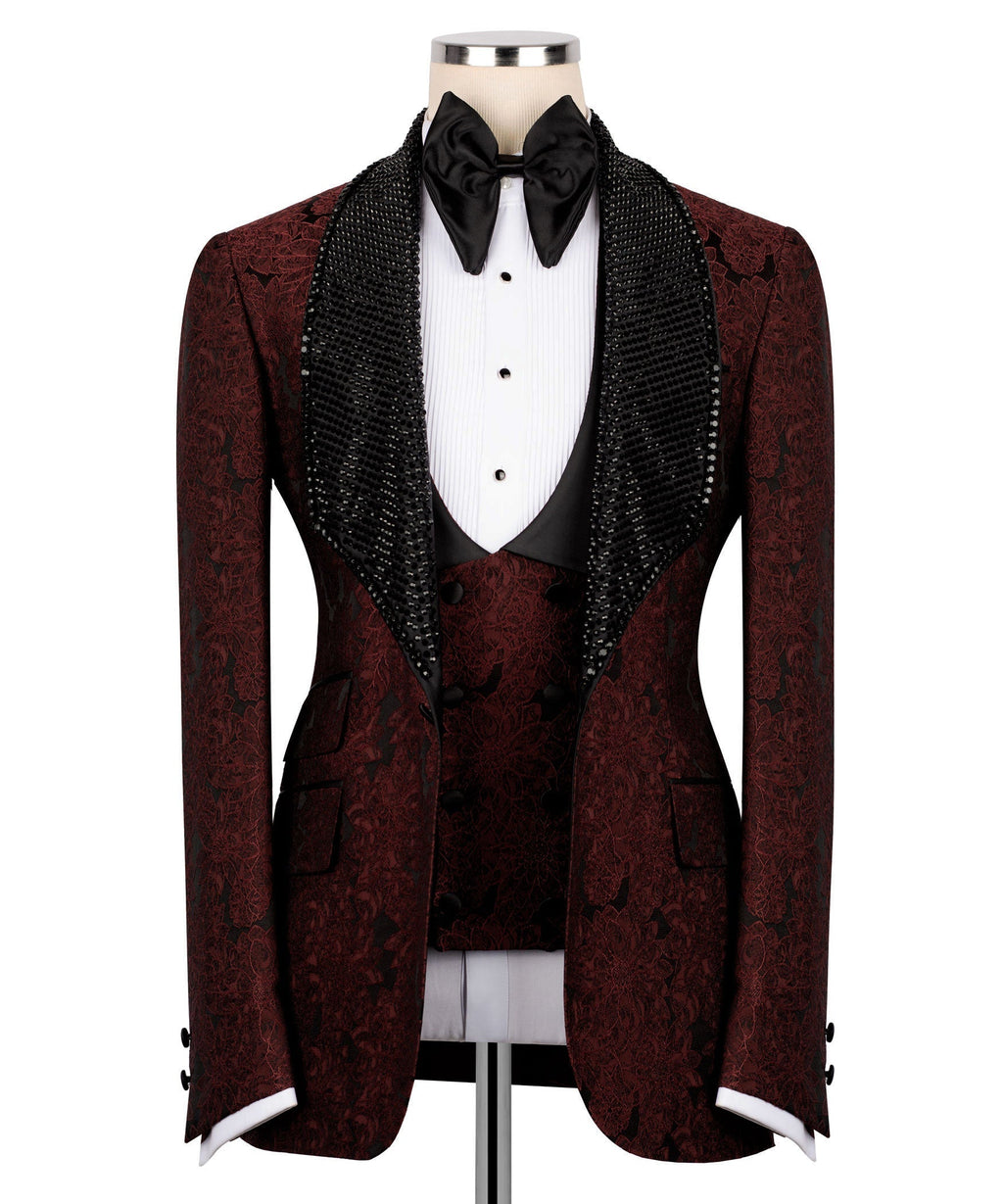 Red embroidered tuxedo jacket with black velvet shawl collar and matching vest
