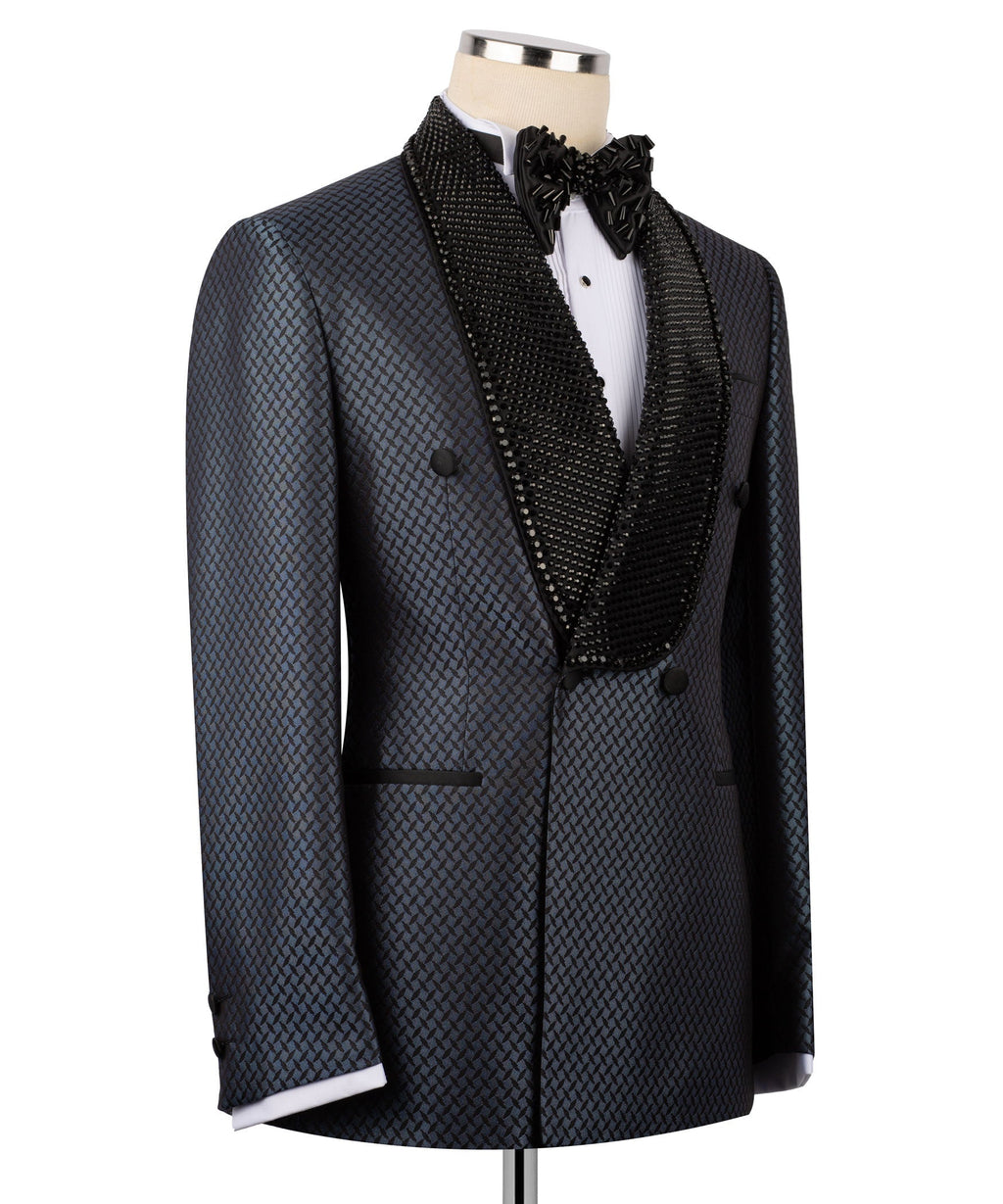Back view of dark blue double-breasted tuxedo jacket with black embroidered lapel trim