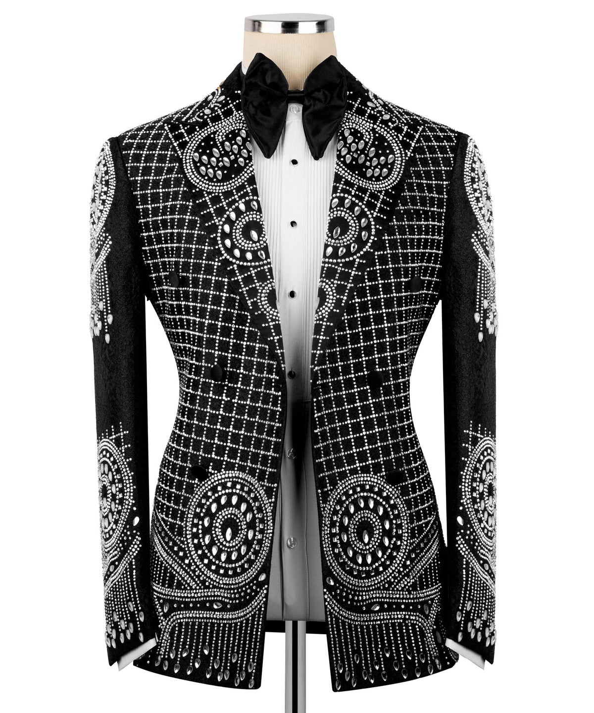 Black tuxedo jacket with silver embroidery over white shirt front and black bow tie