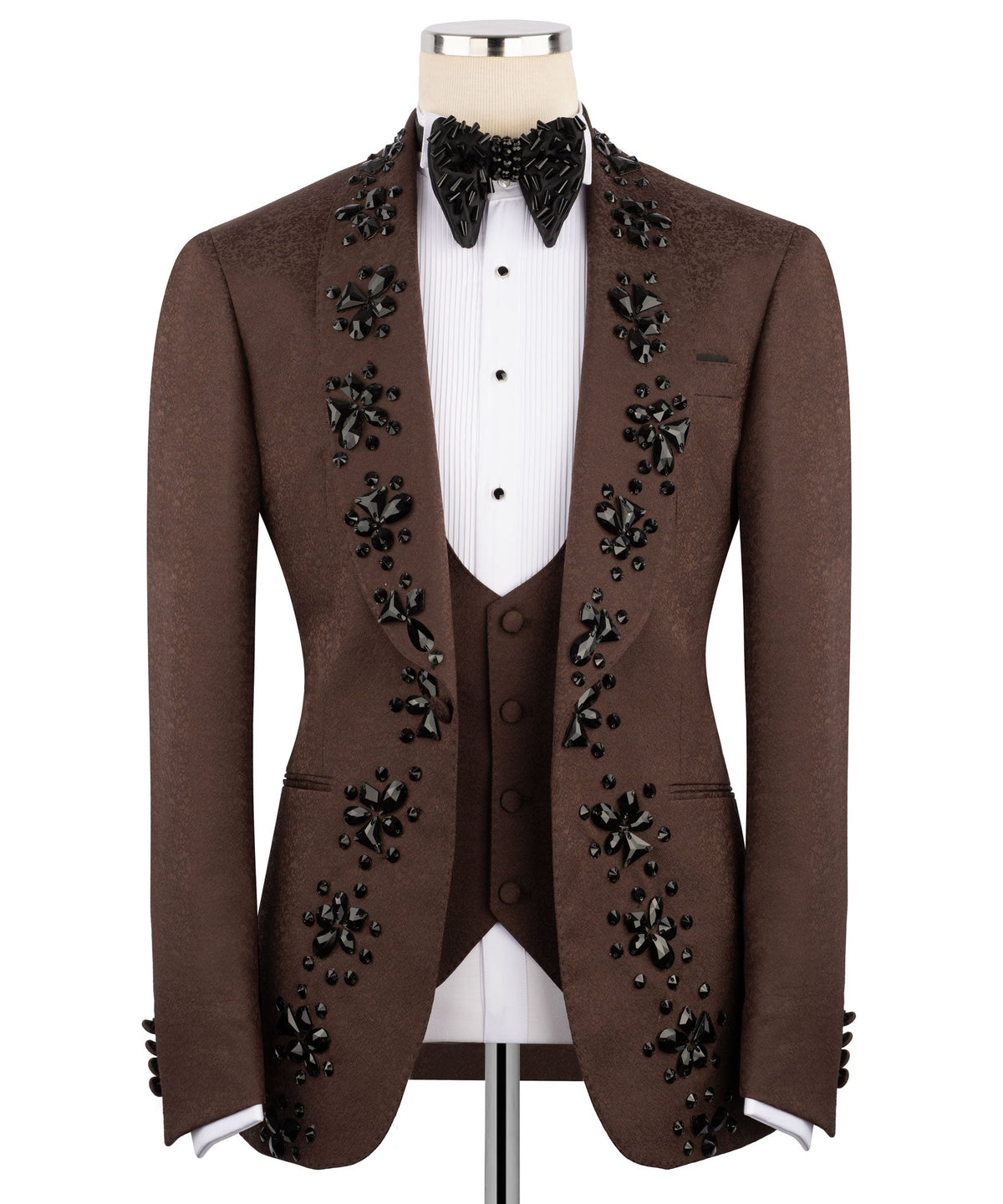 Brown tuxedo jacket with black floral bead embroidery; white shirt and waistcoat