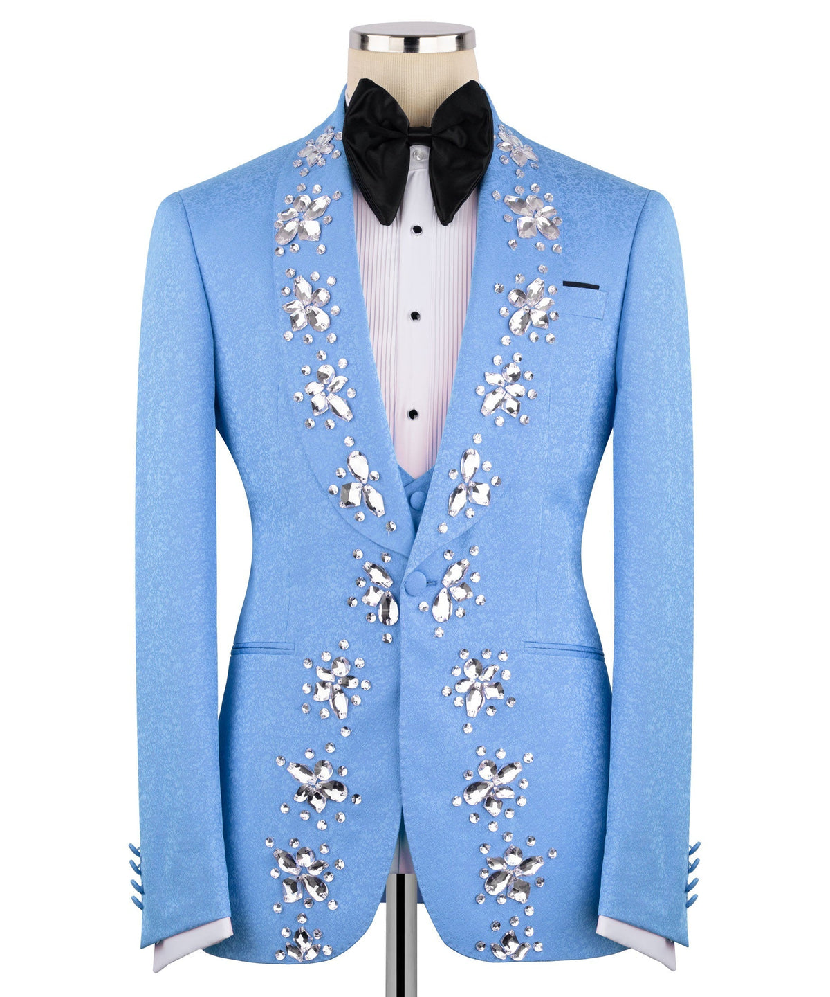 Light blue three-piece tuxedo jacket front with jeweled panels; black bow tie and shirt