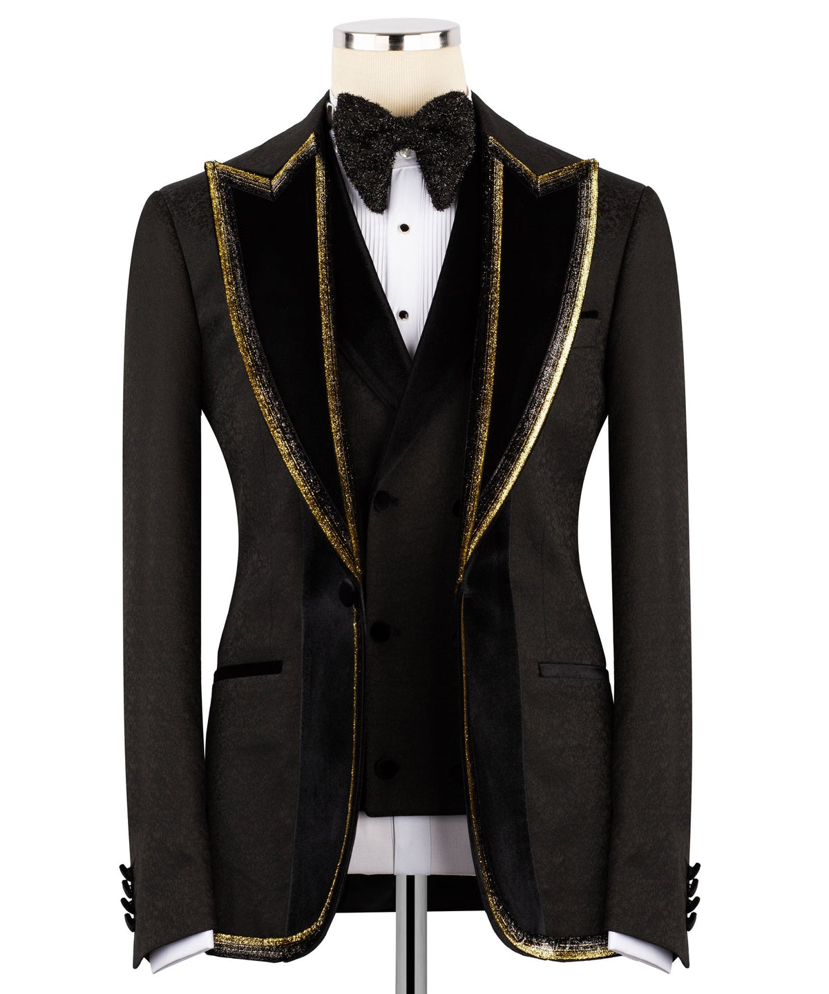 Black tuxedo jacket with embroidered velvet collar, gold trim, and satin lapels
