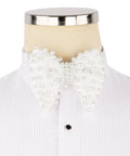 Koss Atelier white silk bow tie adorned with scattered white pearls on a matching pleated tuxedo shirt.