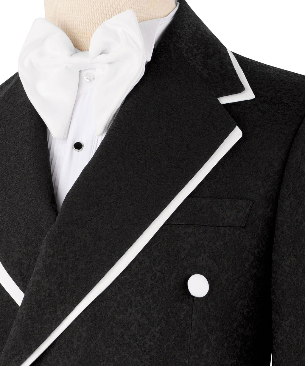 Black tuxedo jacket close-up with satin lapel trim, white bow tie and shirt front