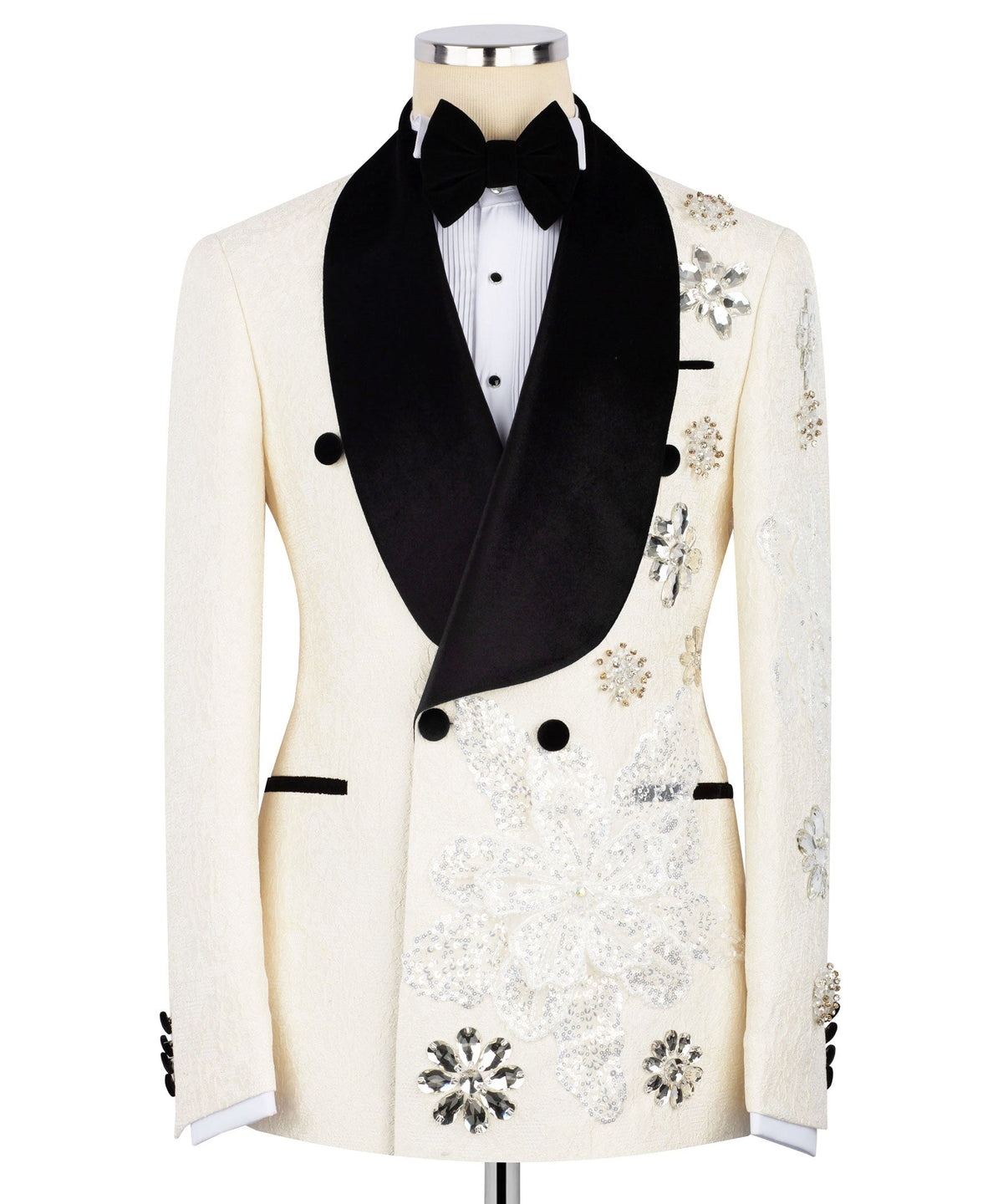 Ivory tuxedo jacket with black velvet lapels, bow tie, and silver jeweled floral embroidery
