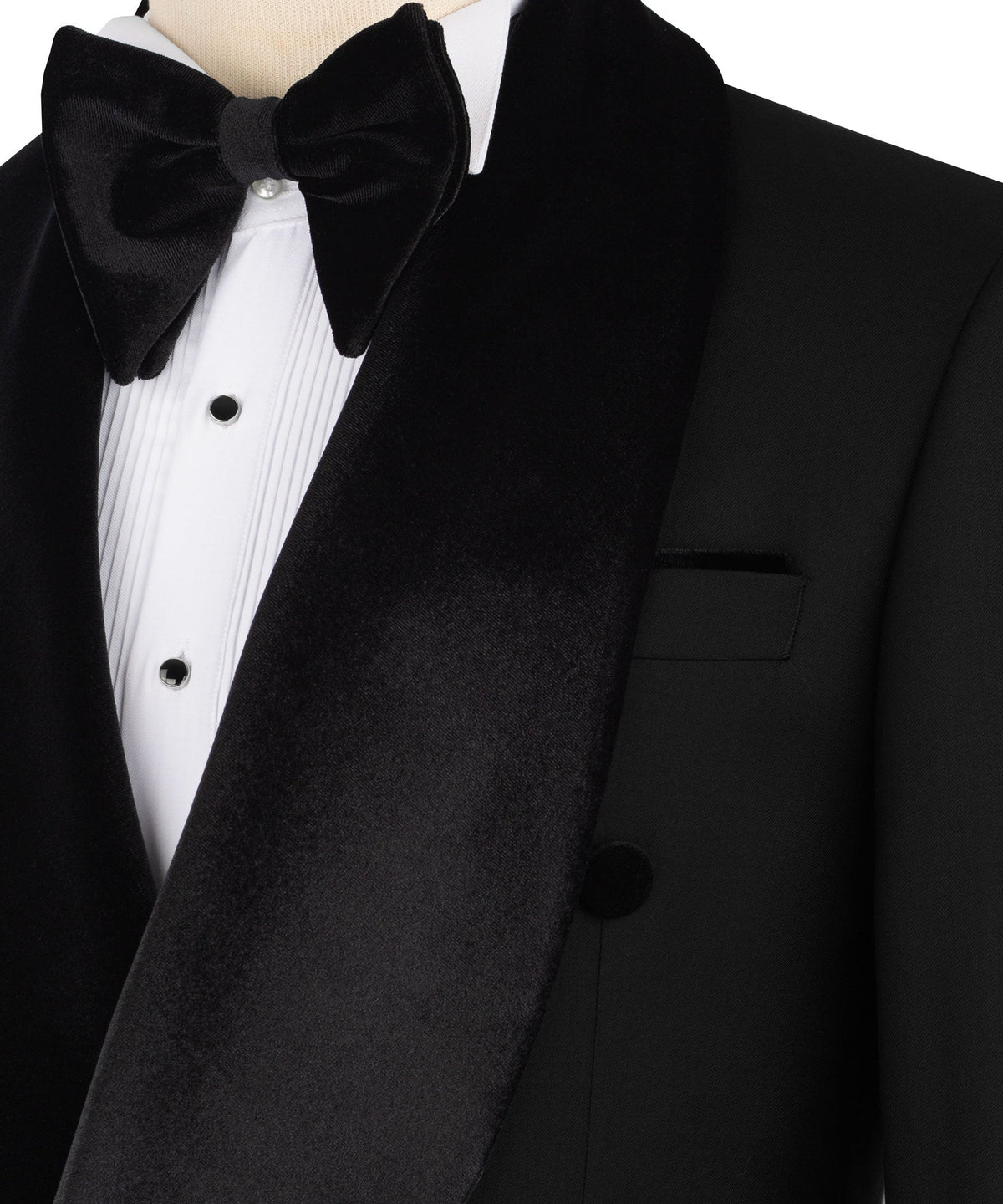 Close-up of black tuxedo lapel with bow tie and white striped dress shirt front