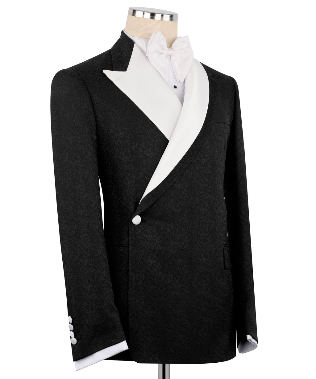 Black tuxedo jacket, double-breasted front with peaked lapels and white dress shirt
