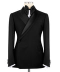 Black double-breasted tuxedo jacket with satin lapels and bow tie