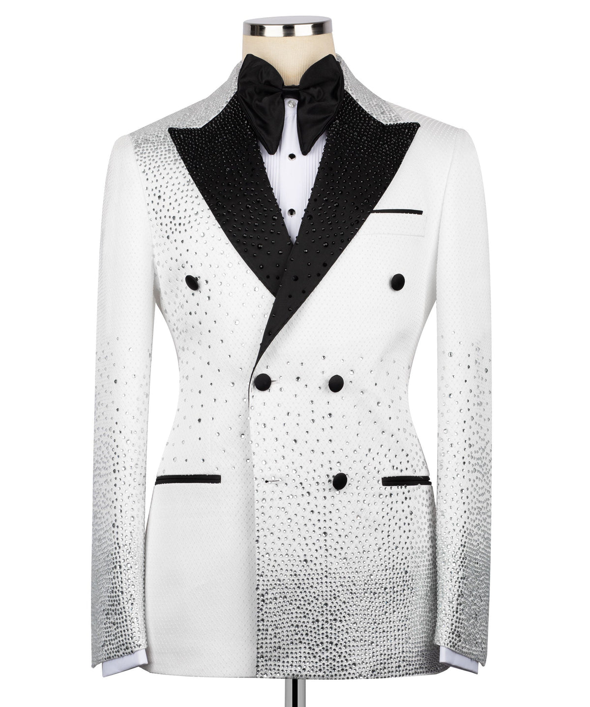 White tuxedo jacket with black satin lapels, bow tie, and double-breasted buttons