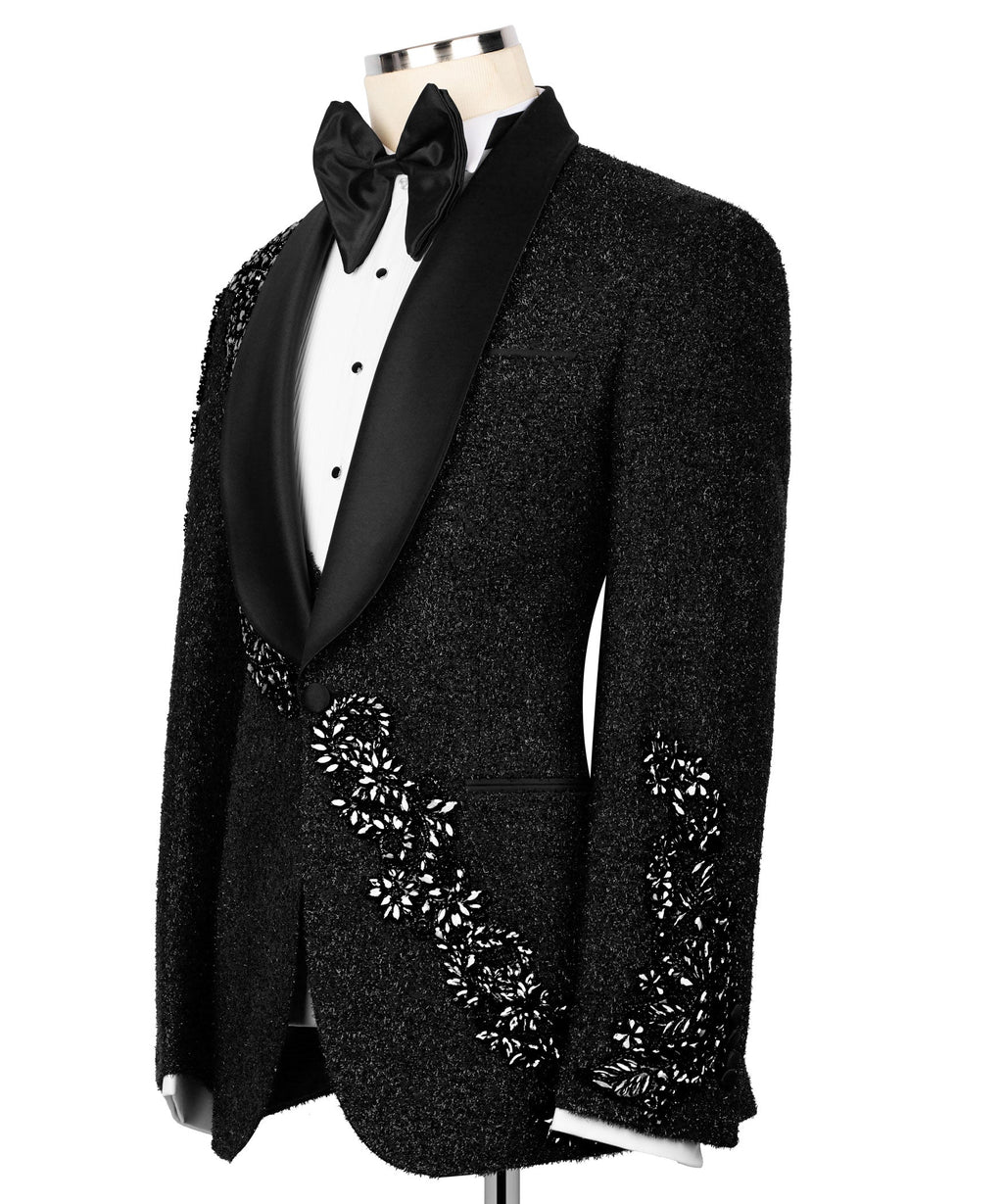Side view black tuxedo jacket with embroidered waist panel and satin lapels