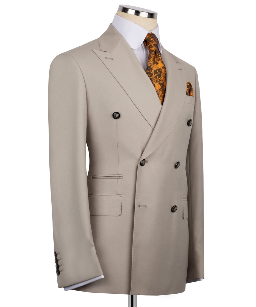 Light taupe double-breasted jacket, flap pockets and sleeve buttons, worn with patterned tie