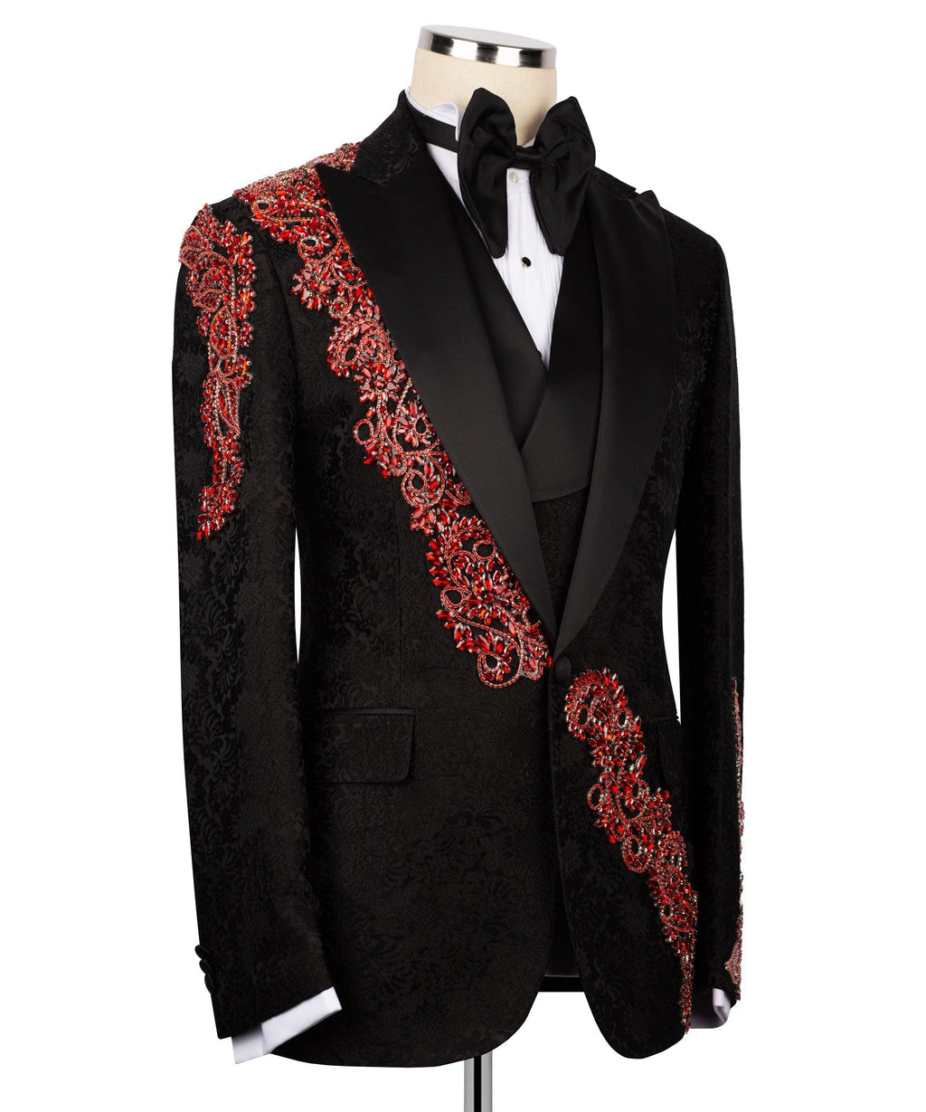 Black tuxedo jacket with red jeweled embroidery on shoulder and chest pocket