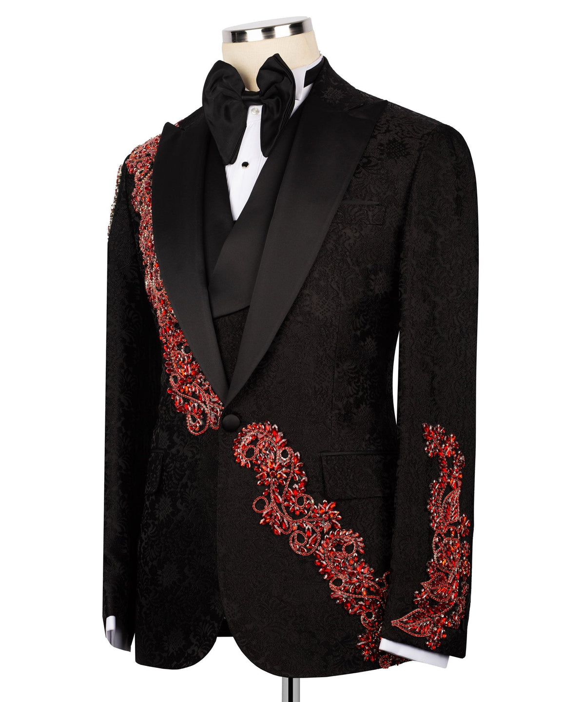 Black tuxedo jacket front with red jeweled embroidery across lapel and front