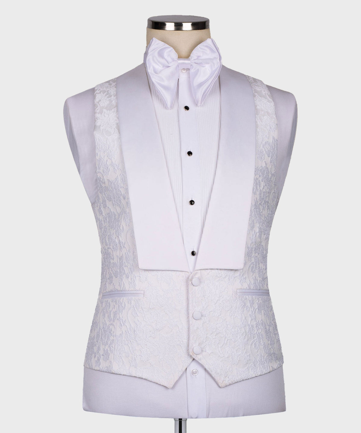 White tuxedo waistcoat and jacket with patterned lapels; pointed collar bow tie