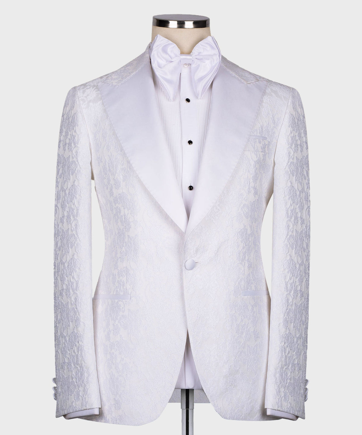 White tuxedo three-piece suit set: pointed-collar jacket, waistcoat front, button details